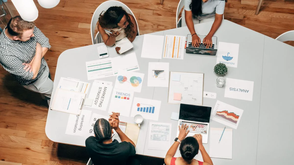 Agency team comparing the best seo software for agencies on a shared planning screen