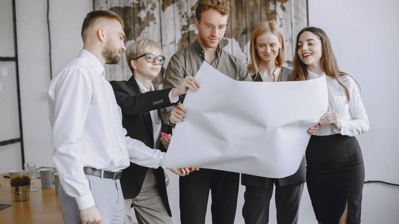 Marketing team planning an SEO automation ROI workflow with human review steps