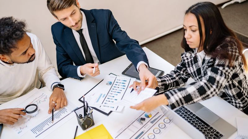 Business team comparing SEO automation platform options for growth planning