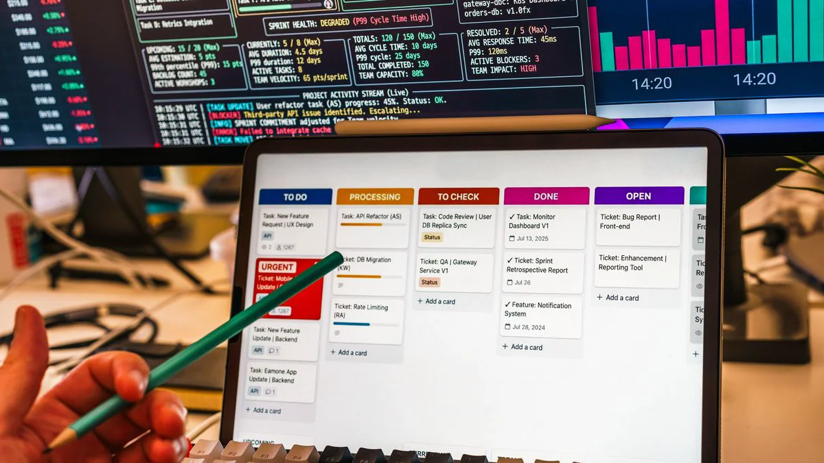 A marketer reviewing content workflow dashboards on a desktop screen.